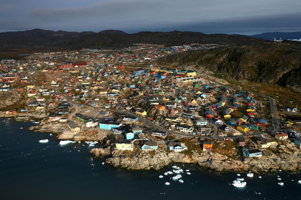 An aerial view of the town of Ilulissat, Greenland. Photo: Uriel Sinai/Getty Images