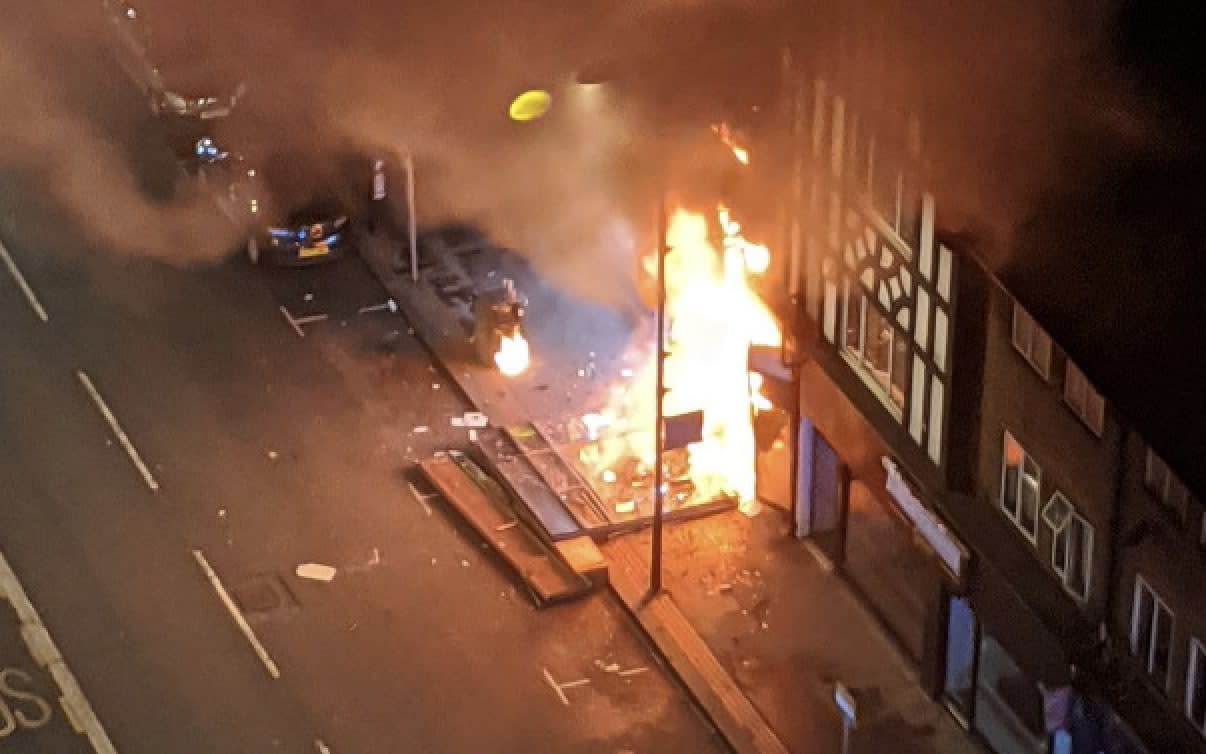 The blaze destroyed the launderette and damaged the flats above it - Twitter