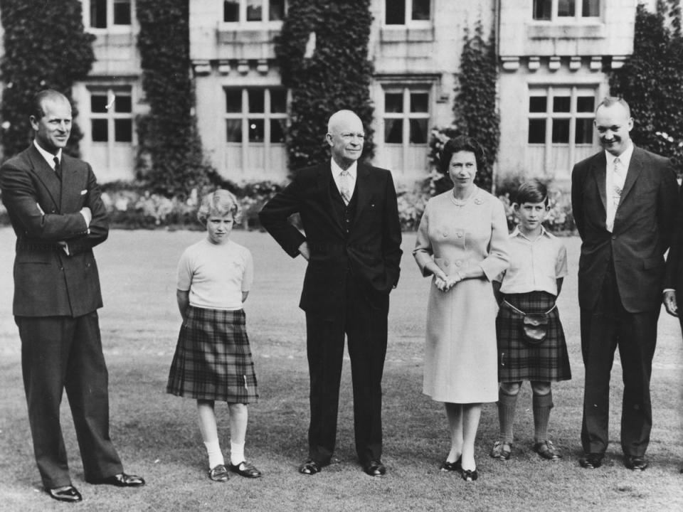 President Eisenhower (centre) with the British Royal family (left to right) Prince Philip, Princess Anne, HM Queen Elizabeth, Prince Charles and Captain John Eisenhower, at Balmoral Castle, Scotland, 1959 (Getty)