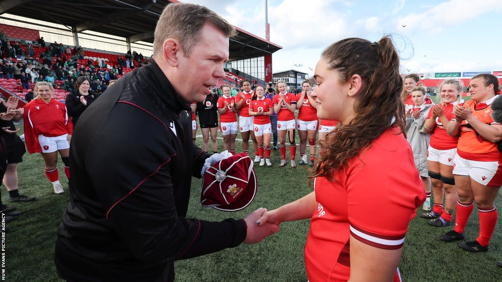 Ioan Cunningham presents Gwennan Hopkins with her first Wales cap