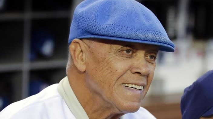 Former Los Angeles Dodgers shortstop Maury Wills is shown before Game Two of baseball’s NL Division Series between the Dodgers and the St. Louis Cardinals in Los Angeles on Oct. 4, 2014. Wills, who helped the Dodgers win three World Series titles with his base-stealing prowess, died Monday night in Sedona, Arizona. He was 89. (Photo: Jae C. Hong/AP, File)