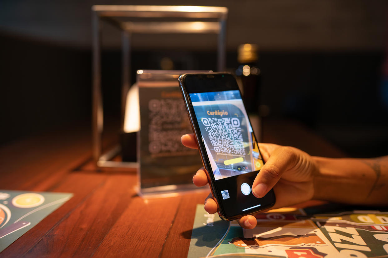 A diner using a QR code ordering app