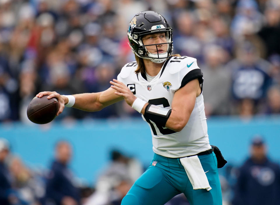 Dec 11, 2022; Nashville, Tennessee, USA; Jacksonville Jaguars quarterback <a class="link " href="https://sports.yahoo.com/nfl/players/33389" data-i13n="sec:content-canvas;subsec:anchor_text;elm:context_link" data-ylk="slk:Trevor Lawrence;sec:content-canvas;subsec:anchor_text;elm:context_link;itc:0">Trevor Lawrence</a> (16) throws the ball during the first quarter at Nissan Stadium. Mandatory Credit: Andrew Nelles/The Tennessean-USA TODAY Sports