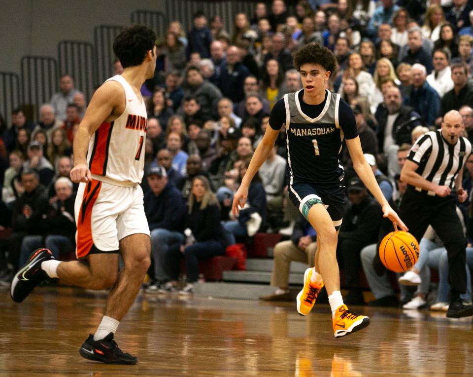 Manasquan's Darius Adams looks for an opening in the NJSIAA Group 2 semifinals against Middle Township on March 2, 2023.
