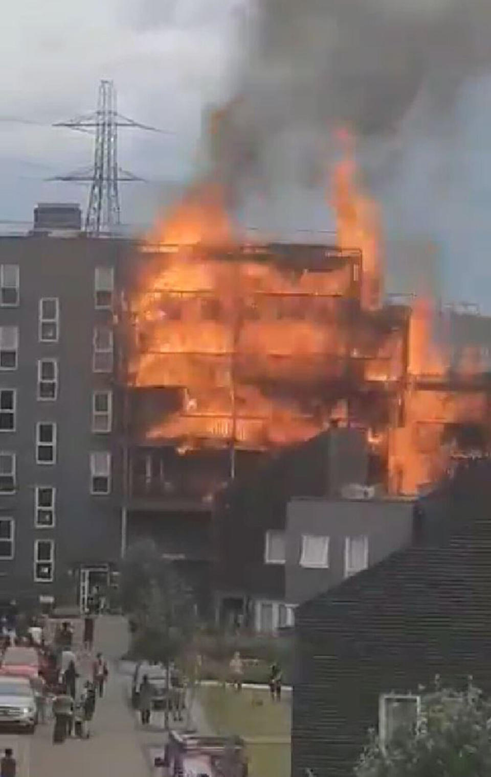 Screengrab taken with permission from a video posted by @SyeddIslam of the fire at a block of flats in Barking, east London.