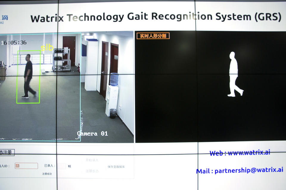In this Oct. 31, 2018, photo, a screen displays images of a Watrix employee walking during a demonstration of their firm's gait recognition software at their company's offices in Beijing. A Chinese technology startup hopes to begin selling software that recognizes people by their body shape and how they walk, enabling identification when faces are hidden from cameras. Already used by police on the streets of Beijing and Shanghai, “gait recognition” is part of a major push to develop artificial-intelligence and data-driven surveillance across China, raising concern about how far the technology will go. (AP Photo/Mark Schiefelbein)