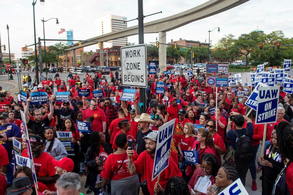 Members of the United Auto Workers (UAW) union march through the streets of downtown Detroit following a rally on the first day of the UAW strike in Detroit, Michigan, on September 15, 2023.