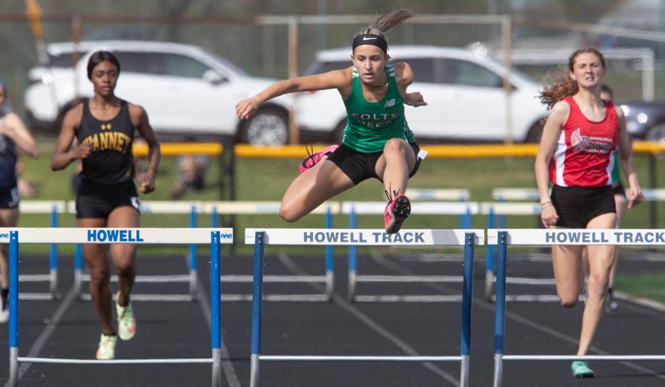 Colts Neck Kylie Jacoulot clears the final hurdle in her team 3X400 intermediate hurdle effort. Monmouth County Track Relays at Howell High School in Howell on May 5, 2022.