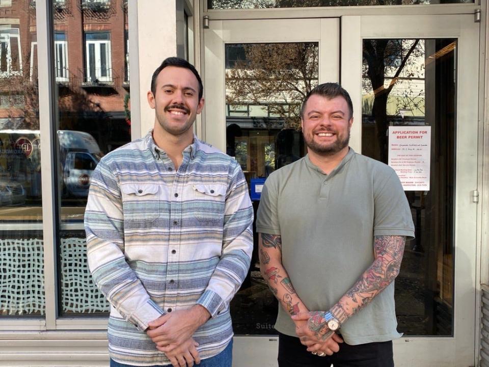 Co-owners Corbin Azambuja (left) and Emmanuel Perez (right) standing in front of the future home of Chismoso Cocktails and Comida. The restaurant doesn't have a set opening date, but the two hope to open in spring 2024 at 131 S. Gay St. Dec. 12, 2023.