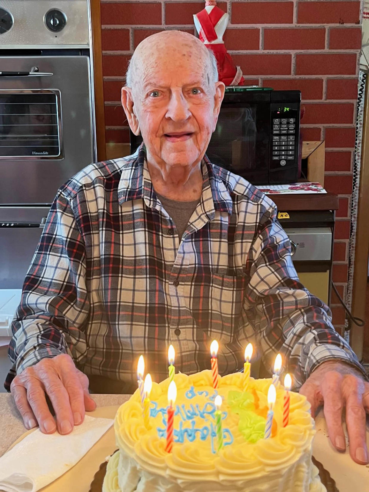 Dransfield enjoys carrot cake, his favorite, for a previous birthday. (Courtesy Erica Lista)