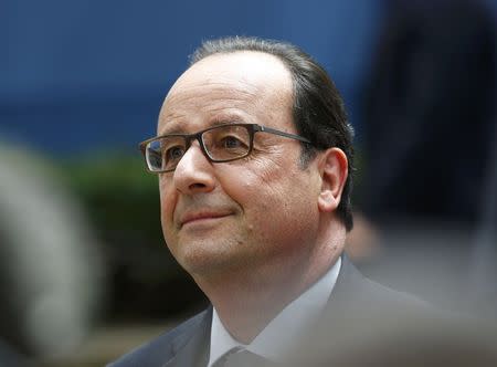 French President Francois Hollande arrives at the European Union (EU) Council headquarters at the start of an EU leaders summit in Brussels, Belgium, June 25, 2015. REUTERS/Darren Staples