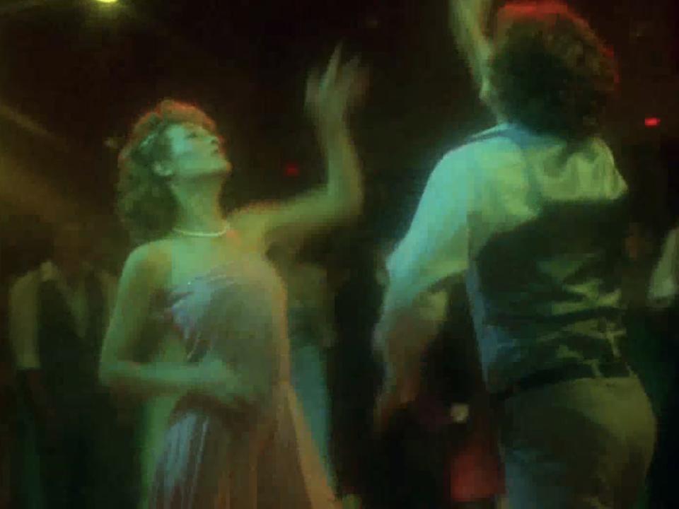 kim dancing in a prom scene in prom night