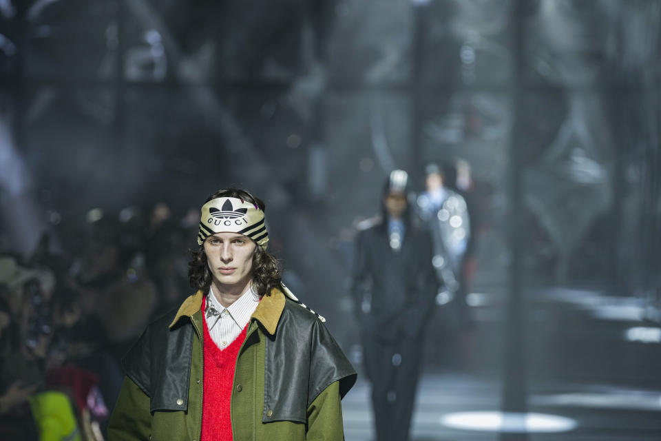 FILE - A model wears a creation as part of the Gucci Fall/Winter 2022-2023 fashion collection, unveiled during the Fashion Week in Milan, Italy, Friday, Feb. 25, 2022. Alessandro Michele is leaving his role as creative director of the Gucci, the fashion house announced Wednesday, Nov. 23, 2022 bringing an end to an eight-year tenure that sharply redefined Gucci’s codes with romanticism and gender-fluidity, all the while powering revenues for the Kering parent. (AP Photo/Antonio Calanni, File)