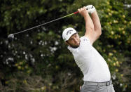 Jon Rahm, of Spain, watches his tee shot on the 16th hole during the second round of the AT&T Byron Nelson golf tournament in McKinney, Texas, Friday, May 14, 2021. (AP Photo/Ray Carlin)