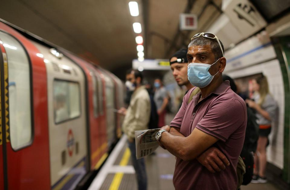Face coverings will be required on public transport from June 15 (AFP via Getty Images)