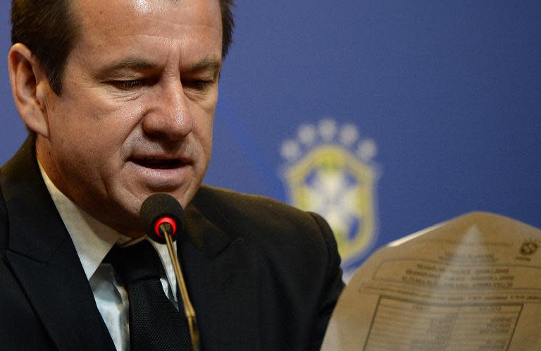 The coach of the Brazilian national football team, Dunga, reads the 23-player roster for the upcoming Copa America tournament to be held in Chile, at the headquarters of the Brazilian Football Confederation (CBF) in Rio de Janeiro on May 5, 2015