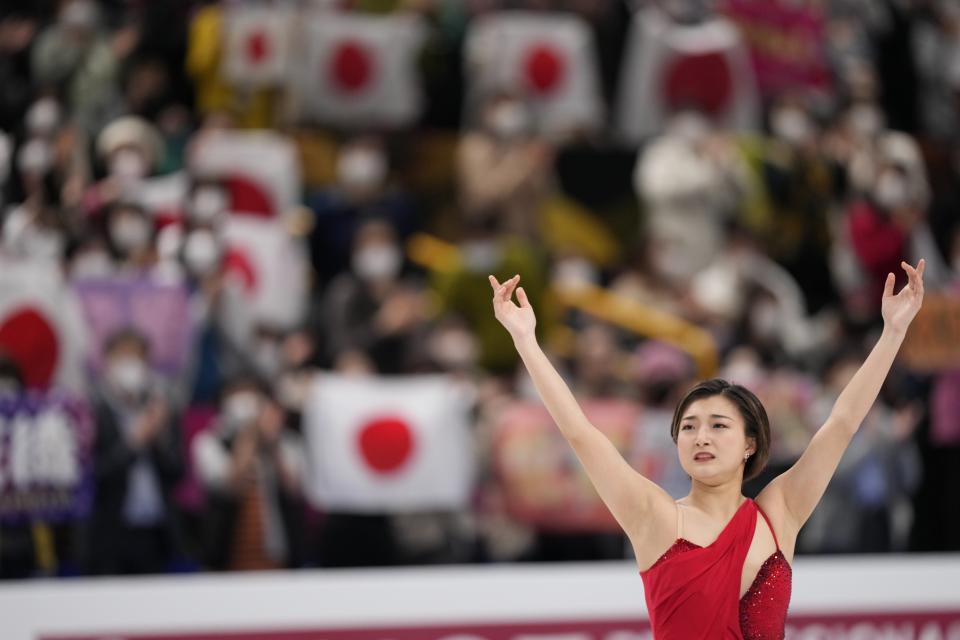 Kaori Sakamoto of Japan reacts after her performance in the women's free skating program in the World Figure Skating Championships in Saitama, north of Tokyo, Friday, March 24, 2023. (AP Photo/Hiro Komae)