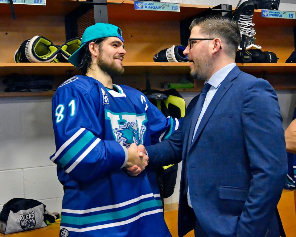 Worcester Railers captain Anthony Repaci (left) shakes the hand of head coach and general manager Jordan Lavallee-Smotherman following a game this season at the DCU Center.