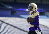 Washington quarterback Michael Penix Jr. runs a drill during the NCAA college football team's practice Wednesday, Aug. 2, 2023, in Seattle. (AP Photo/Lindsey Wasson)