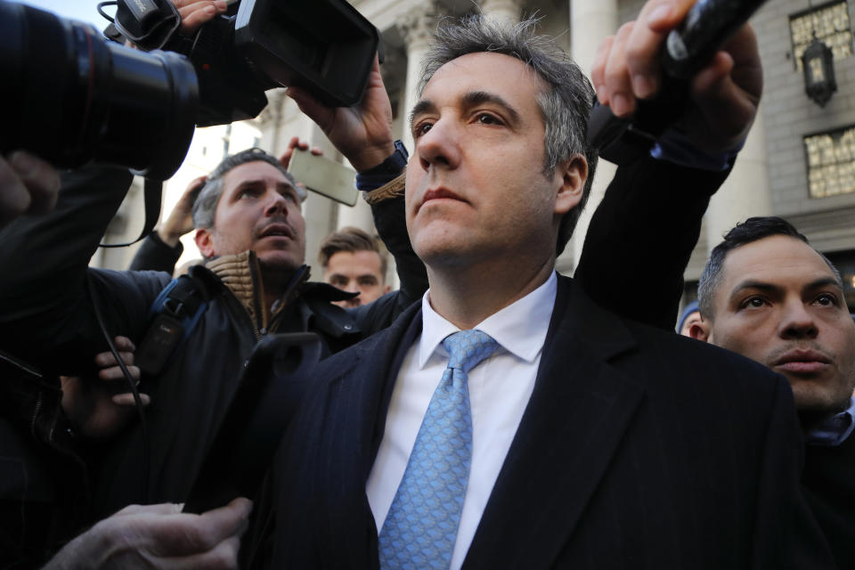 In this Nov. 29, 2018, photo, Michael Cohen walks out of federal court in New York. A pattern of deception by advisers to President Donald Trump, aimed at covering up Russia-related contacts during the 2016 campaign and transition, has unspooled bit by bit in criminal cases from special counsel Robert Mueller. (AP Photo/Julie Jacobson)