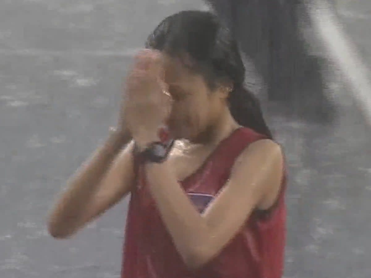 Video of Cambodian runner Bou Samnang  finishing 5000m race in pouring rain has won hearts  (Twitter/Screengrab/@Olympics)