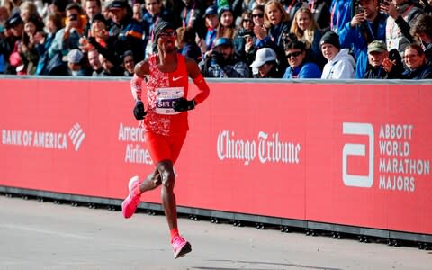 Mo Farah competes during the 2019 Bank of America Chicago Marathon on October 13, 2019  - Credit: AFP