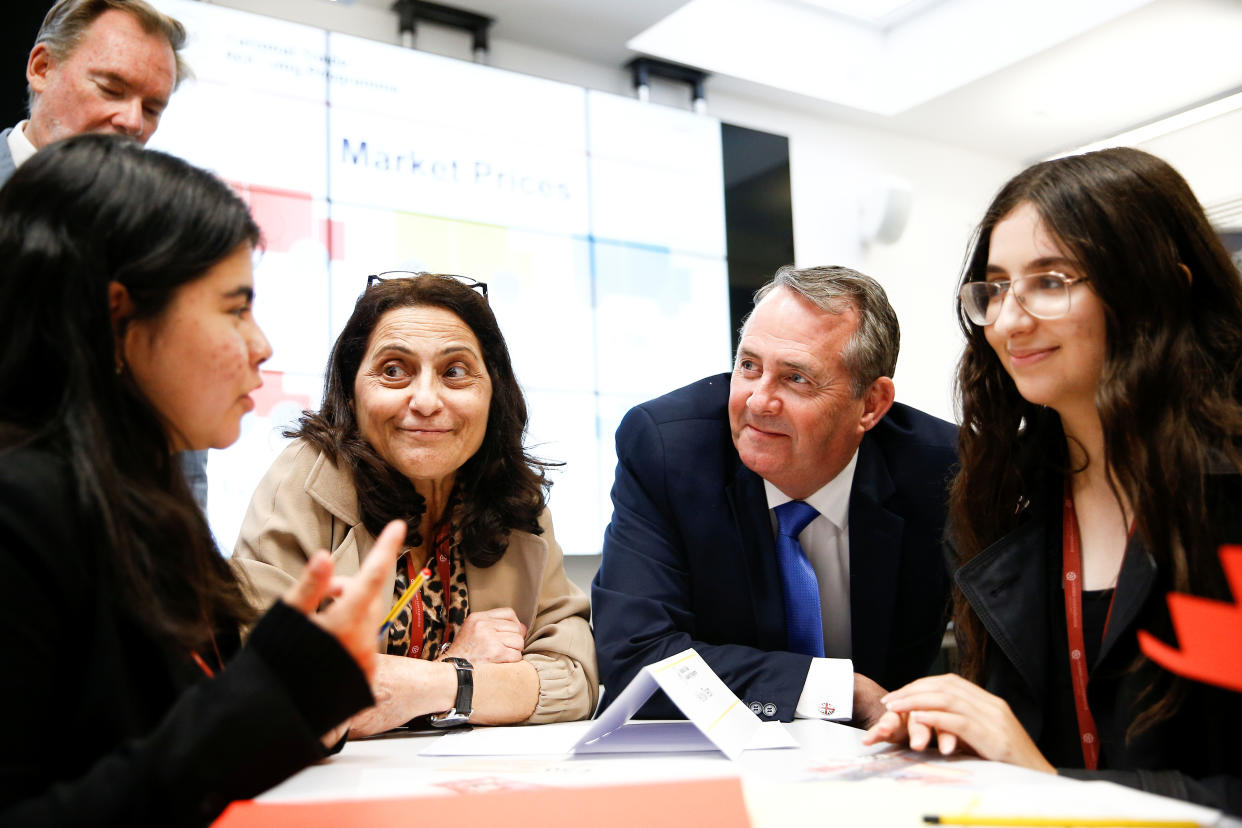 Britain's Secretary of State for International Trade Liam Fox visits students taking part in a mock trade negotiation at Harris Westminster Sixth Form college in central London, Britain July 10, 2019. Picture taken July 10, 2019. REUTERS/Henry Nicholls