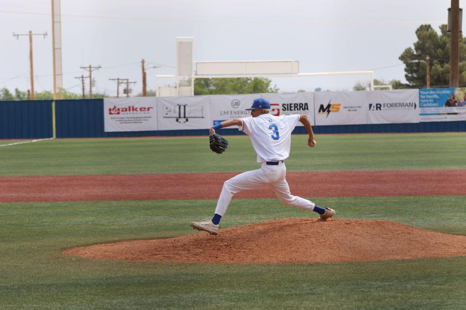 Carlsbad's Eloy Lopez prepares to fire a pitch against Las Cruces Centennial during the opening round of the 5A state playoffs May 11, 2024 in Carlsbad