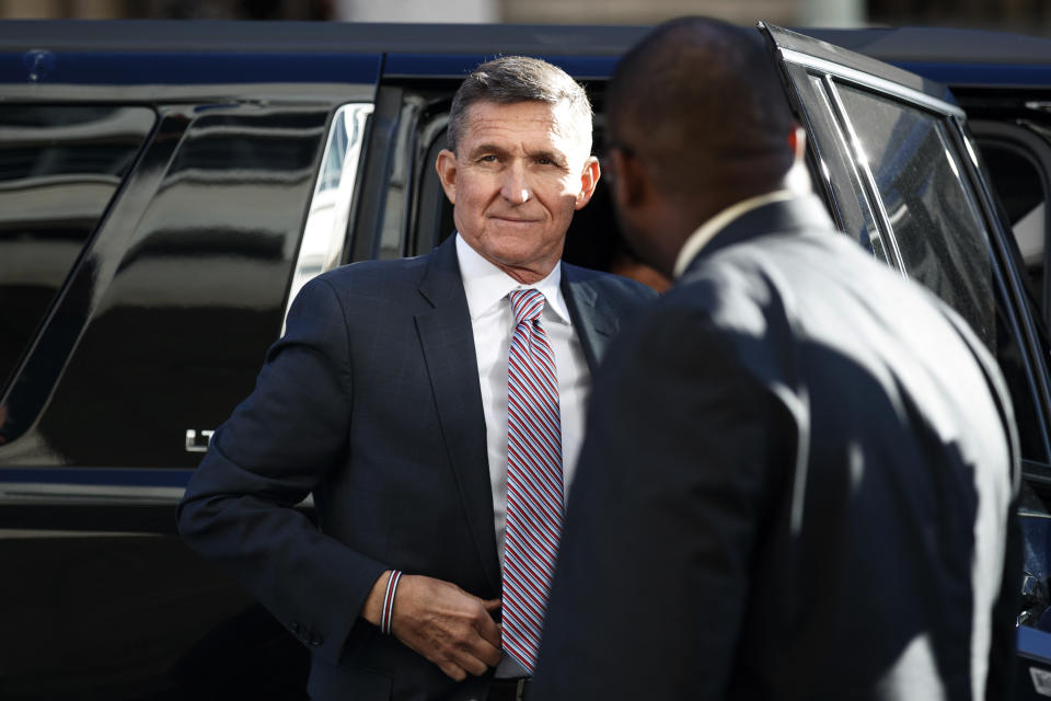 FILE - In this Dec. 18, 2018, file photo, President Donald Trump's former National Security Advisor Michael Flynn arrives at federal court in Washington. A former federal judge appointed to review the Justice Department's motion to dismiss criminal charges against ex-national security Michael Flynn has found that the government's request should be denied because there is “clear evidence of a gross abuse of prosecutorial power.” Former U.S. District Judge John Gleeson says in a filing Wednesday that the government “has engaged in highly irregular conduct to benefit a political ally of the President.” (AP Photo/Carolyn Kaster, File)