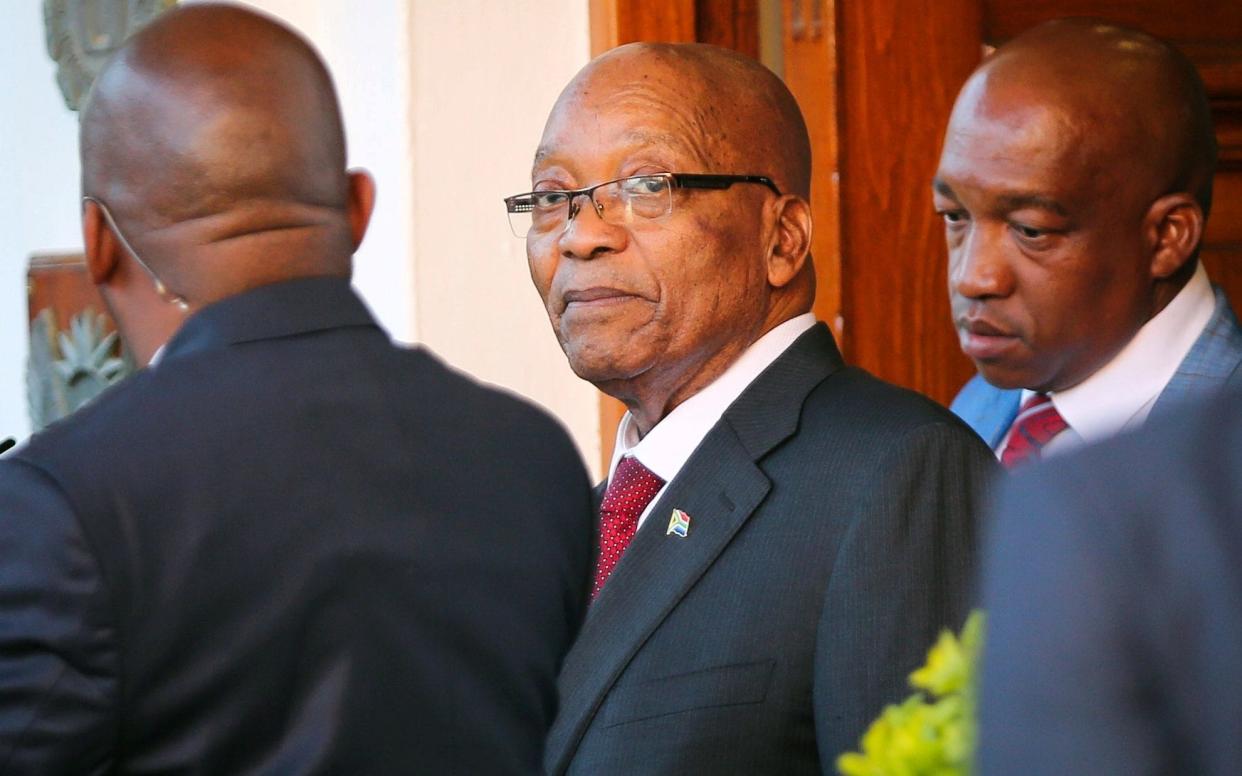 Jacob Zuma leaves Tuynhuys, the office of the Presidency in Cape Town - REUTERS