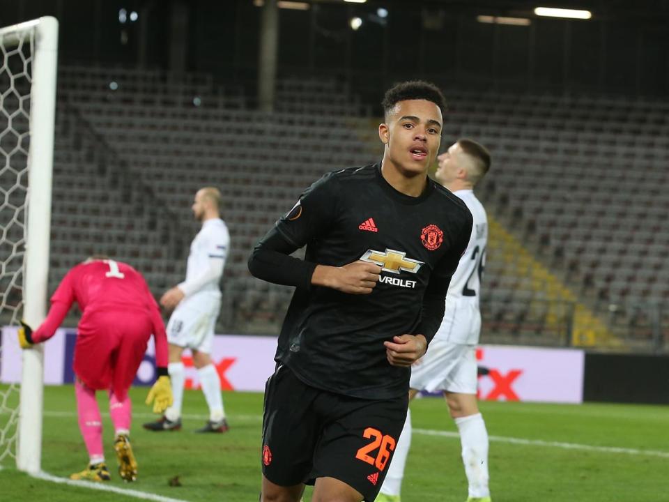 Mason Greenwood celebrates scoring for Manchester United against LASK: Manchester United via Getty Images