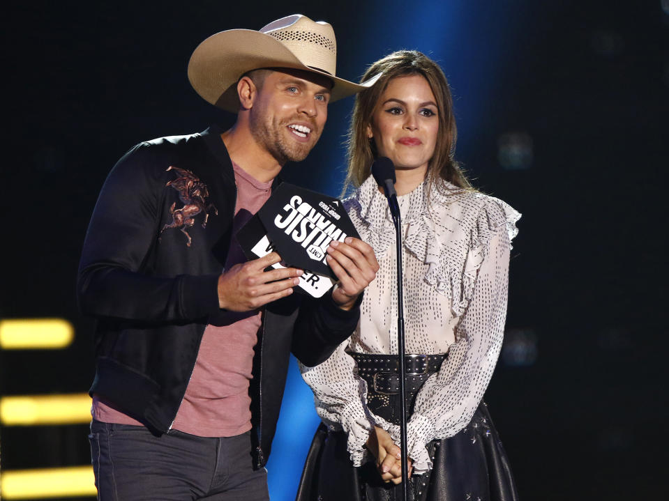 <p>Dustin Lynch and Rachel Bilson present the award for group video of the year at the CMT Music Awards at Music City Center on Wednesday, June 7, 2017, in Nashville, Tenn. (Photo by Wade Payne/Invision/AP) </p>