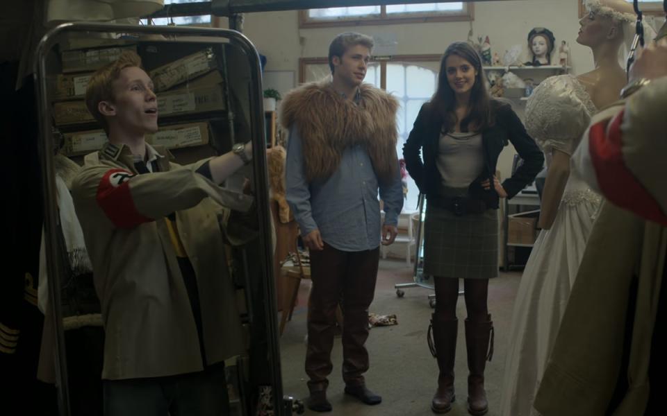 Harry (Luther Ford) tries on his costume in front of William (Ed McVey) and Kate (Meg Bellamy) (Netflix)