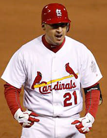 The Cardinals' Allen Craig celebrates his pinch-hit single for the go ahead run