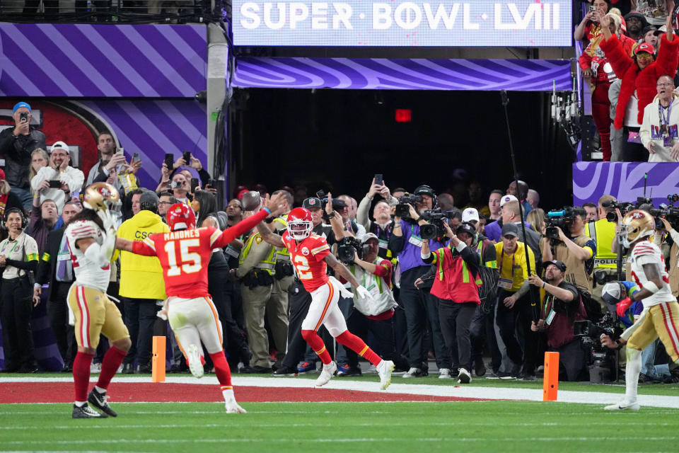 Feb 11, 2024; Paradise, Nevada, USA; Kansas City Chiefs wide receiver Mecole Hardman Jr. (12) celebrates after a game winning catch for a touchdown against the San Francisco 49ers during overtime of Super Bowl LVIII at Allegiant Stadium. Mandatory Credit: Kyle Terada-USA TODAY Sports