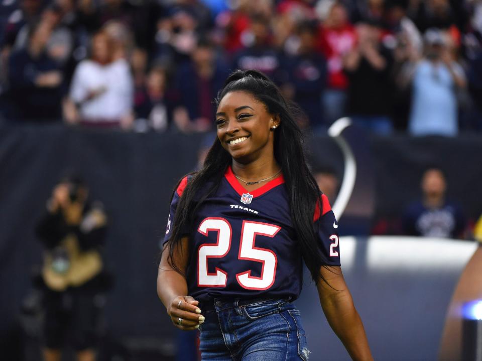 Simone Biles at a Houston Texans game.