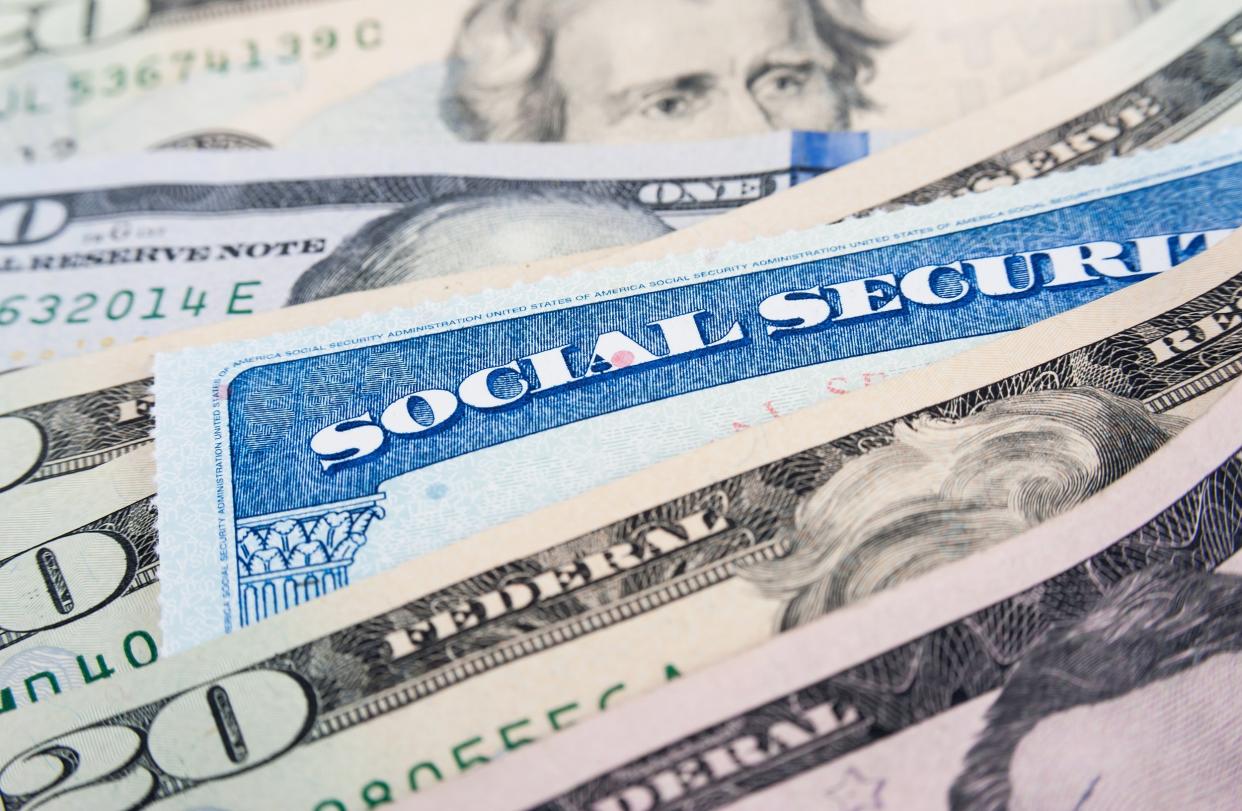 social security card and $20 dollar bills