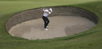 Northern Ireland's Rory McIlroy plays out of a bunker on the 6th green during the first round British Open Golf Championship at Royal St George's golf course Sandwich, England, Thursday, July 15, 2021. (AP Photo/Peter Morrison)