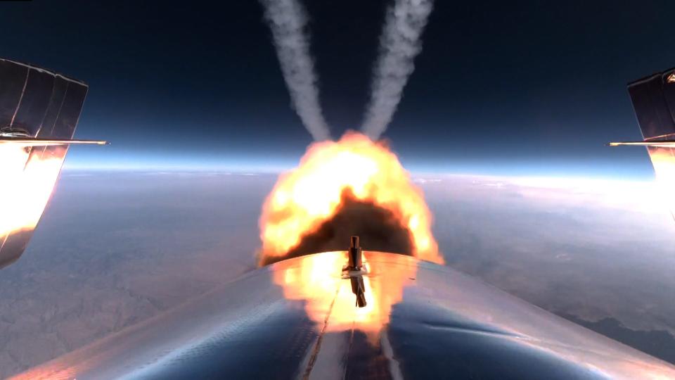 The rocket firing on a Virgin Galactic spacecraft