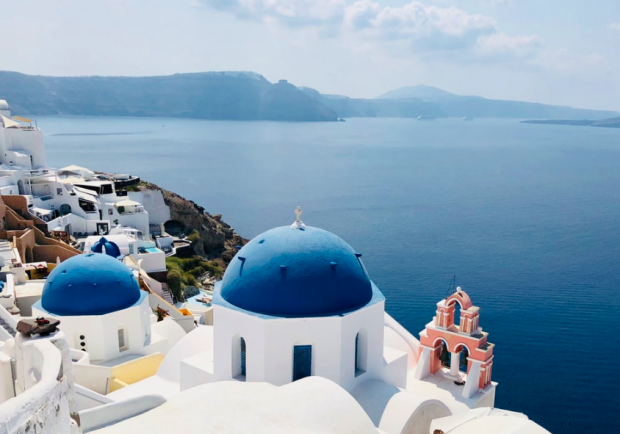 <p>Unsplash</p><p>This volcanic island is famous for its whitewashed buildings that overlook the Aegean Sea. A stay at <a href="https://go.skimresources.com?id=113896X1572730&xs=1&url=https%3A%2F%2Fwww.tripadvisor.com%2FHotel_Review-g482941-d235738-Reviews-Perivolas_Lifestyle_Houses-Oia_Santorini_Cyclades_South_Aegean.html&sref=https%3A%2F%2Fparade.com%2F1002608%2Fmarynliles%2Fbest-anniversary-getaways%2F" rel="noopener" target="_blank" data-ylk="slk:Perivolas Lifestyle Houses;elm:context_link;itc:0;sec:content-canvas" class="link ">Perivolas Lifestyle Houses</a> will give you a specially catered experience to boost your anniversary getaway.</p>