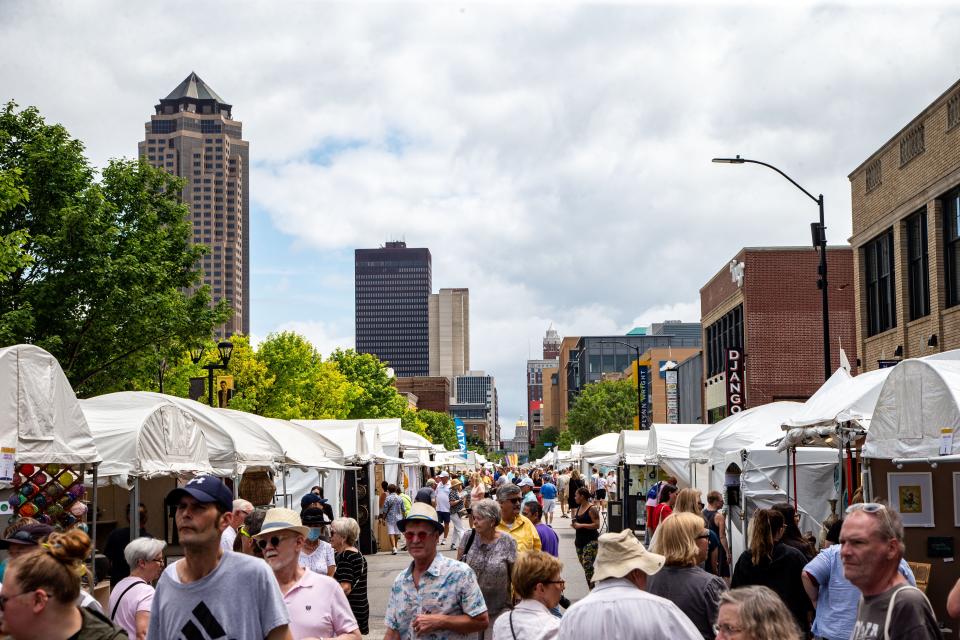 The Des Moines Arts Festival lines the streets around Western Gateway in downtown Des Moines.