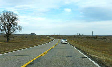 A car of get-out-the-vote workers driving from Fort Yates to Porcupine, North Dakota to canvass tribal members ahead of the 2018 mid-term elections on the Standing Rock Reservation in the U.S., October 26, 2018. REUTERS/Dan Koeck