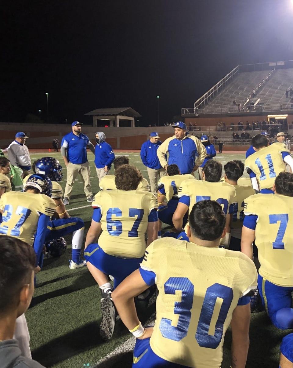 San Diego head football coach Bo Ochoa talks to the Vaqueros following their season ending loss to Vanderbilt Industrial at San Antonio Heroes Stadium.