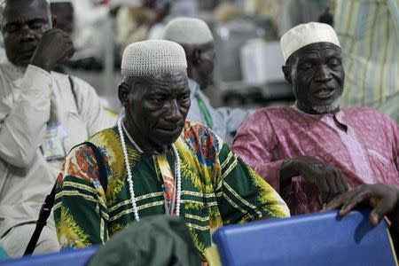 Pilgrims returning from their Haj in Saudi Arabia look on at the General Aviation Terminal of the Abuja Airport, Nigeria September 29, 2015. REUTERS/ Afolabi Sotunde