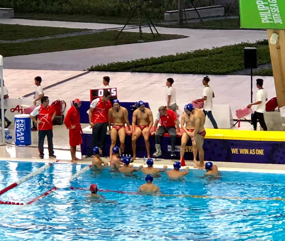 The Singapore water polo team during a time out in their 5-7 defeat by Indonesia at the SEA Games in the Philippines (PHOTO: Singapore Swimming Association/Facebook)