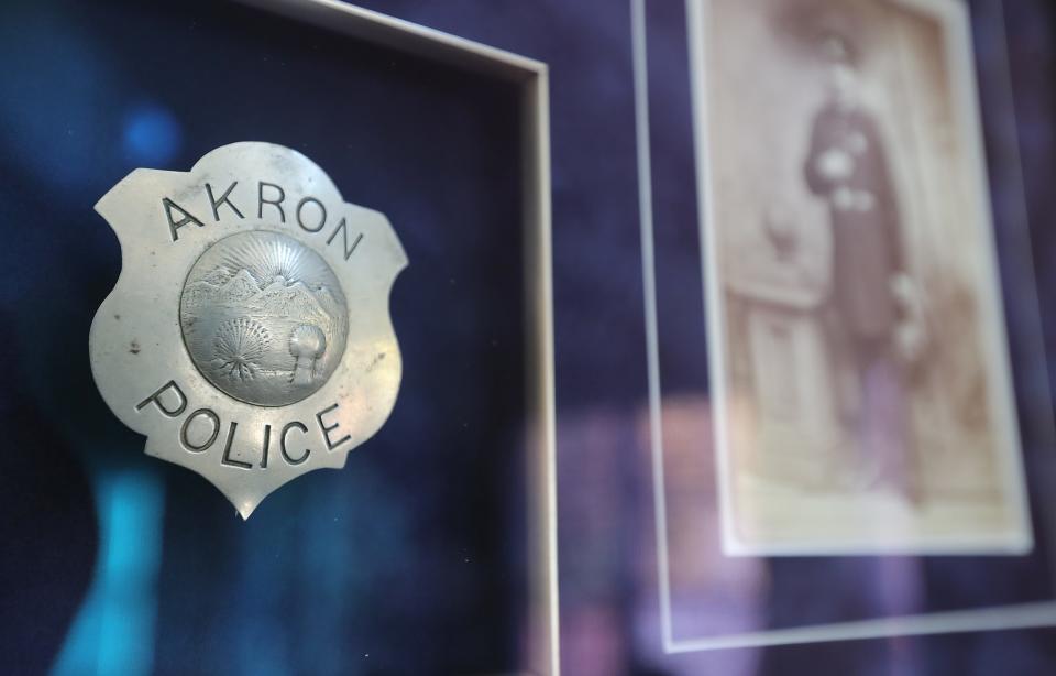 One of Tom Dye’s favorites from his collection is a first-issue Akron badge from 1872.