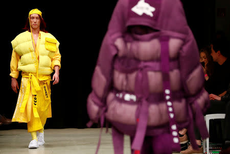 A model presents a creation by students of fashion colleges during the Berlin Fashion Week Autumn/Winter 2019/20 in Berlin, Germany, January 14, 2019. REUTERS/Fabrizio Bensch