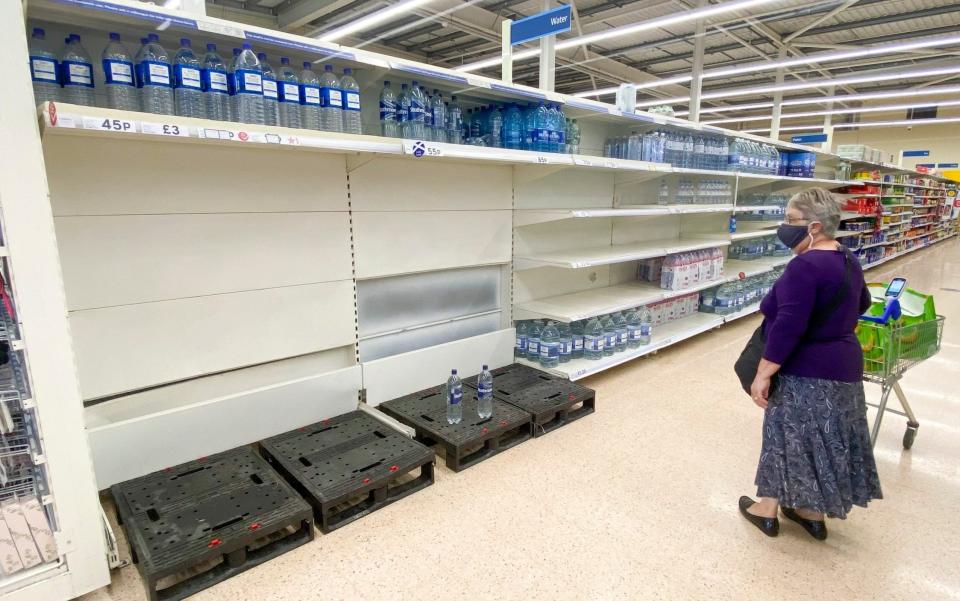 Depleted bottled water shelves at a Tesco in Bathgate, West Lothian - Katielee Arrowsmith/SWNS