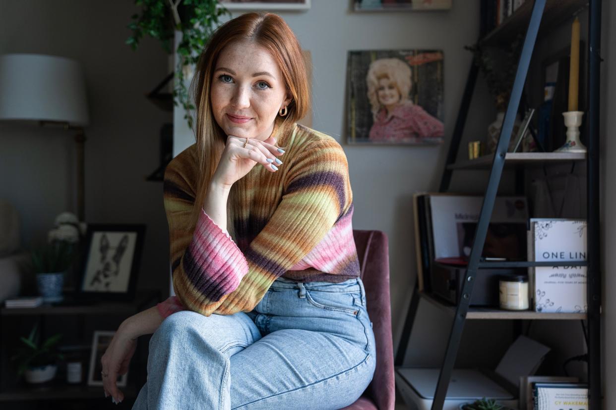 Liz Fleming, known as Liz from Iowa on TikTok, poses for a photo at her home in Des Moines.