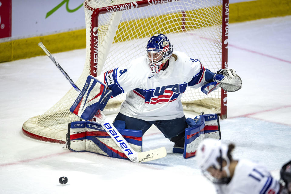 United States goaltender Aerin Frankel (31) stops a shot against Canada during the second period of a Rivalry Series hockey game Friday, Feb. 9, 2024, in Regina, Saskatchewan. (Liam Richards/The Canadian Press via AP)